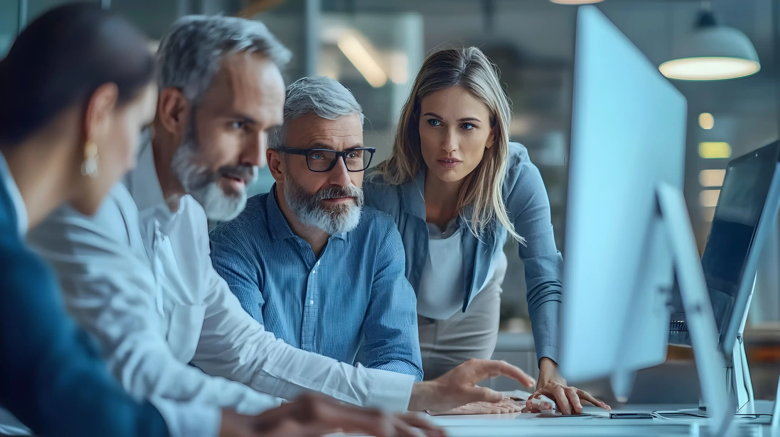 professional-team-discussing-data-making-decisions-office-setting copy