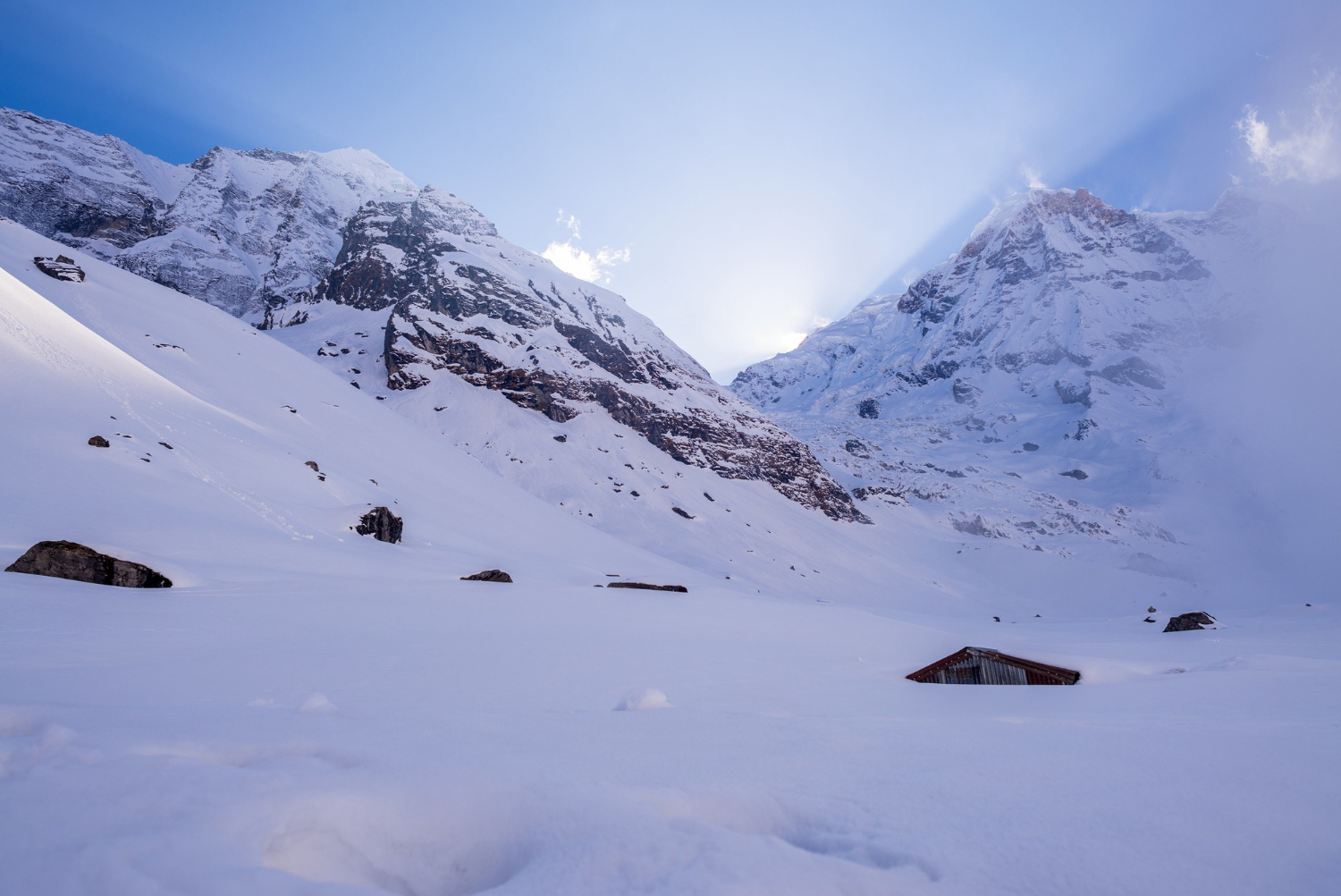 an image a snow- covered mountain, symbolising White Labelling vs Outsourcing