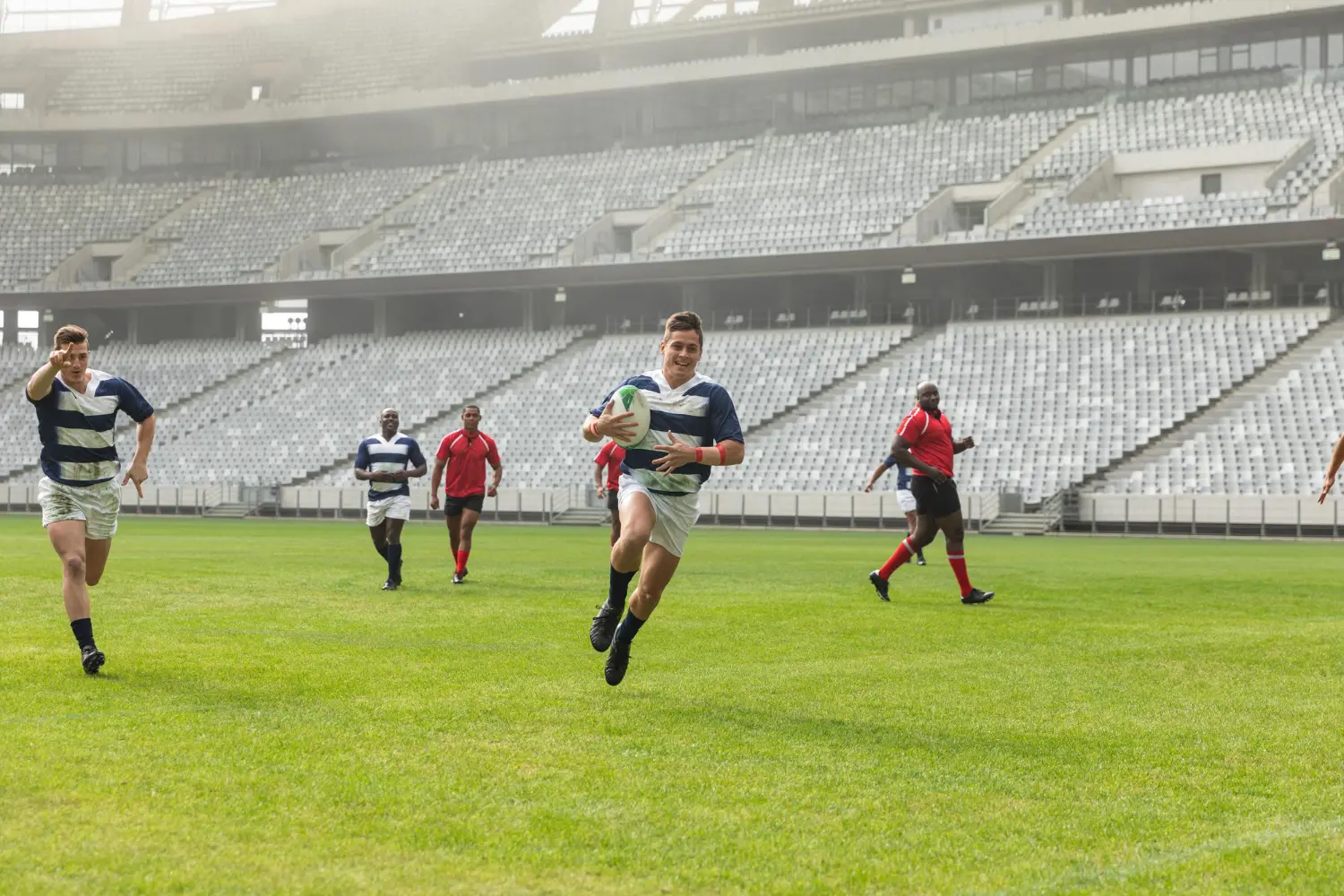 an image of rugby players having a friendly game symbolizing happy businesses who partnered with DBA Advisory