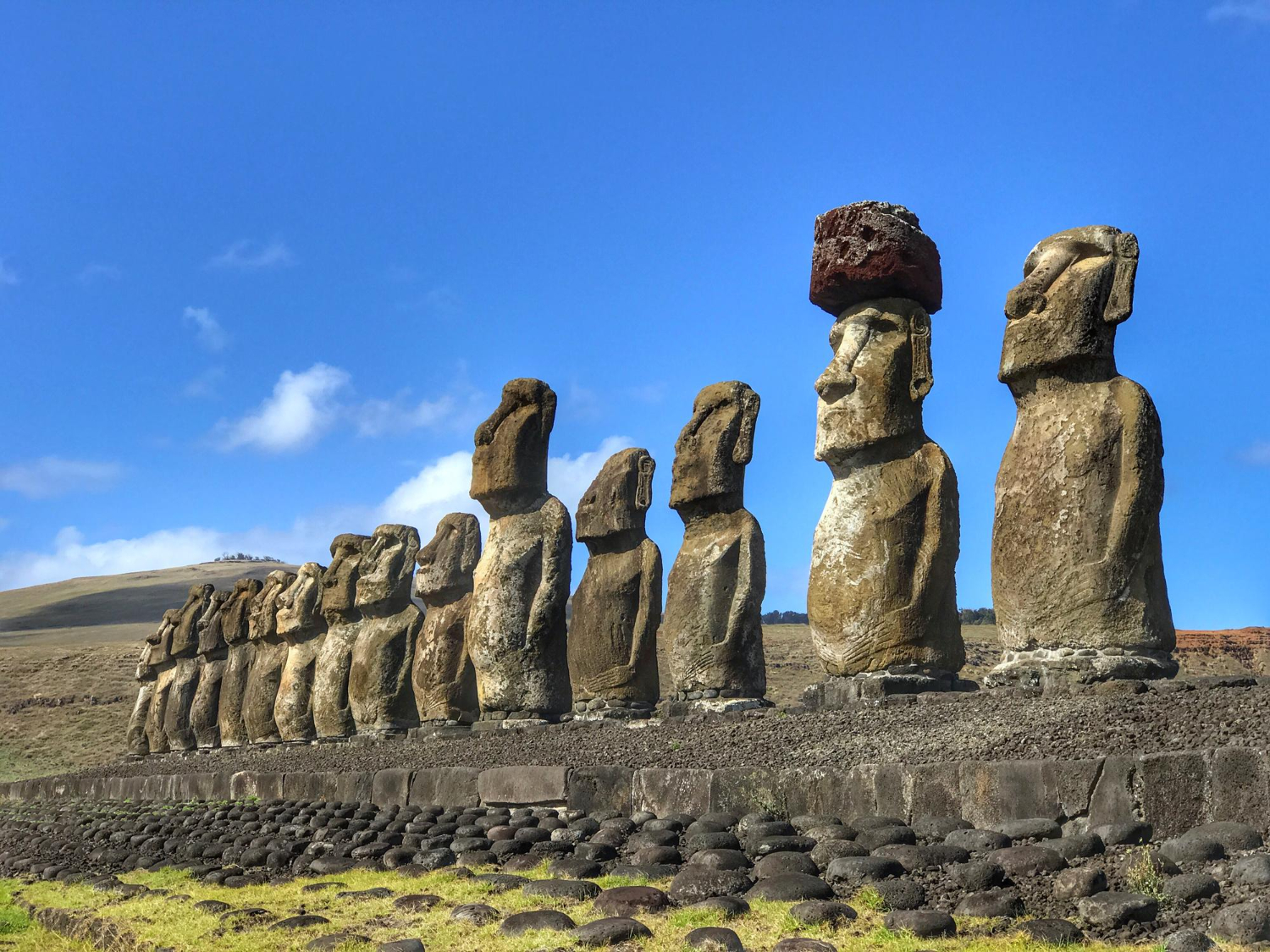 an image of some Moai statues in Easter Island symbolising the impacts of Global Talent Arbitrage