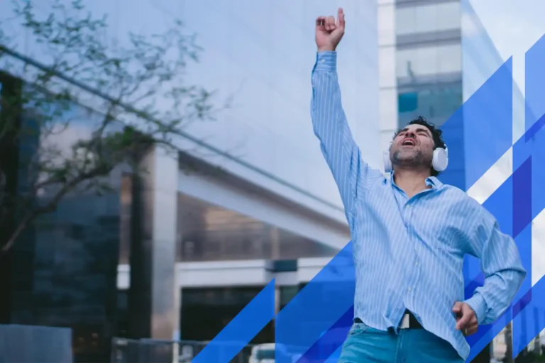 an image of a male business owner with headphones on, celebrating the success of his partnership with DBA Advisory and the significant impacts of our private enterprise advisory