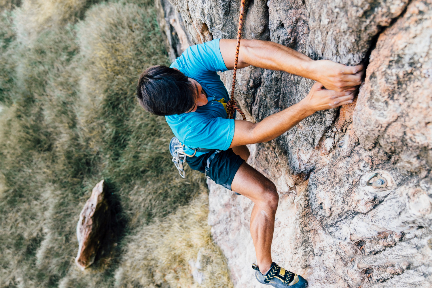 an image of a mountain climber hanging on the side of a cliff, symbolising the strict requirements businesses must observe re: Fixed-Term Contract Limits