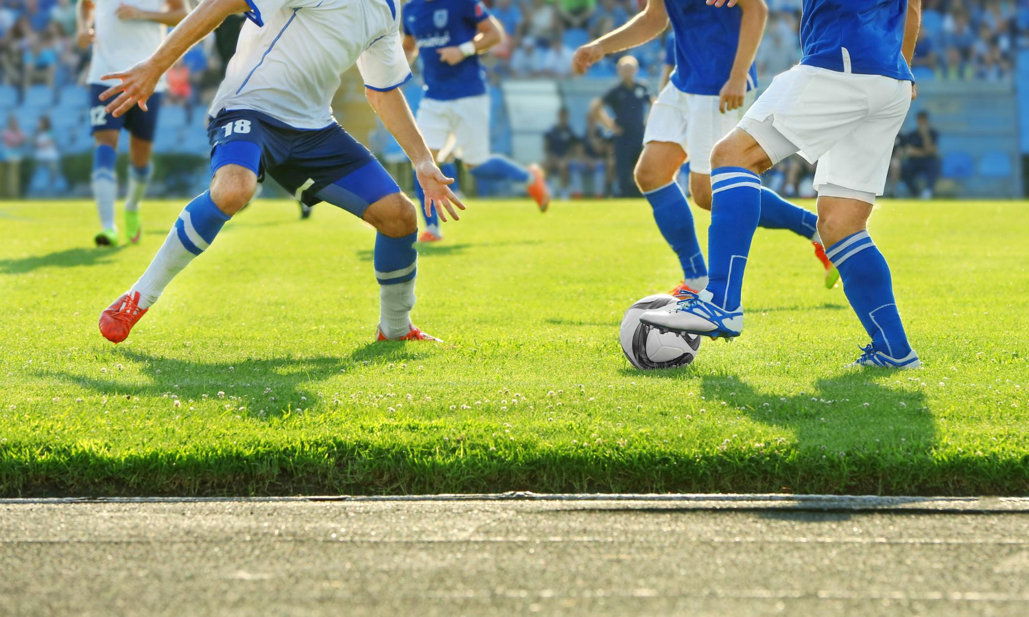 an image of soccer players fighting against each other in a mini tournament, demonstrating the need for Fixed-Term Contract Limits are met and binding.