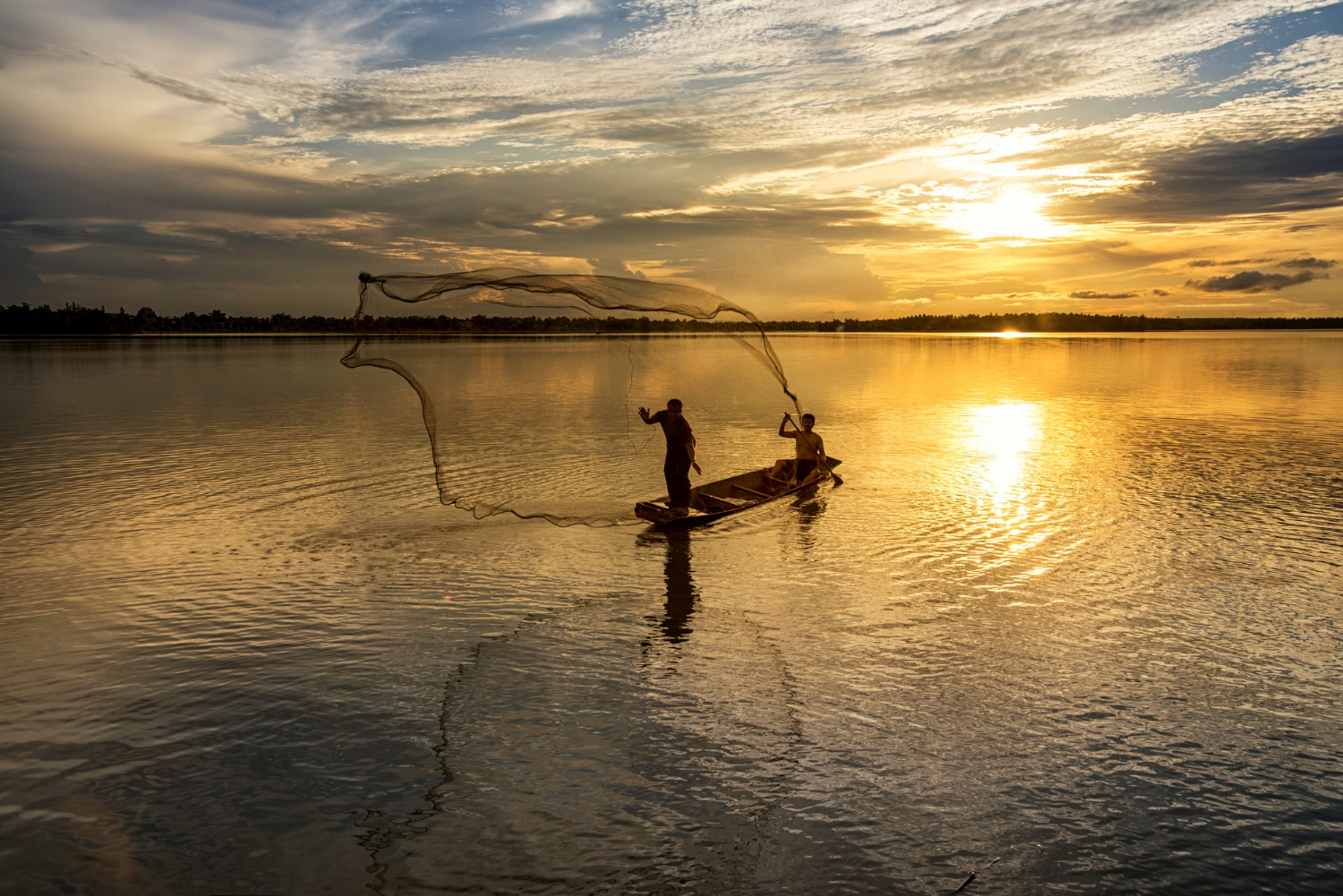 an image of a fisherman, casting out his net at a quiet lake while the sun sets in the background, symbolising the Essential Eight cybersecurity guidance, from the Australian Signals Directorate