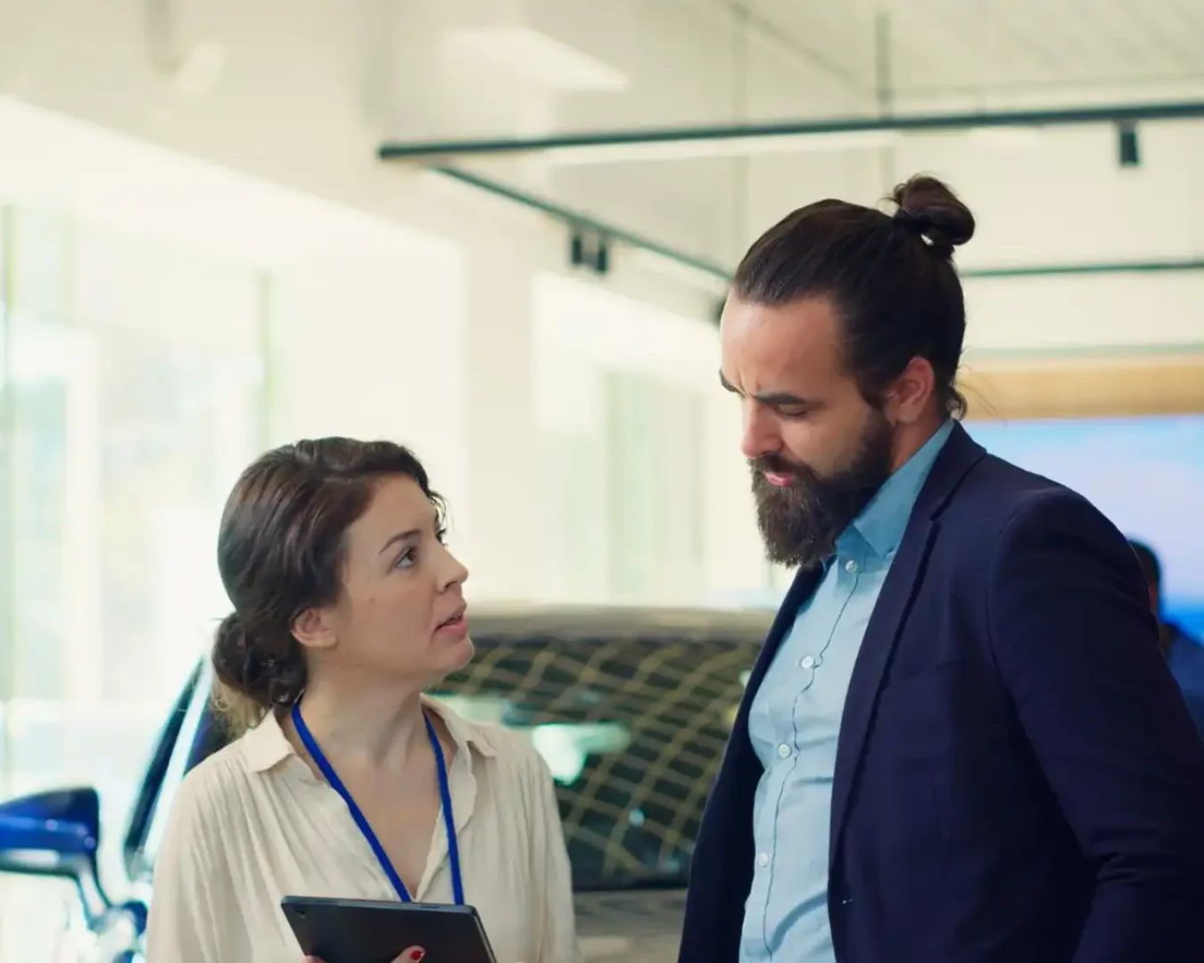 an image of a female compliance officer checking with her male supervisor the results of the AML/CTF Compliance Services provided by DBA Advisory
