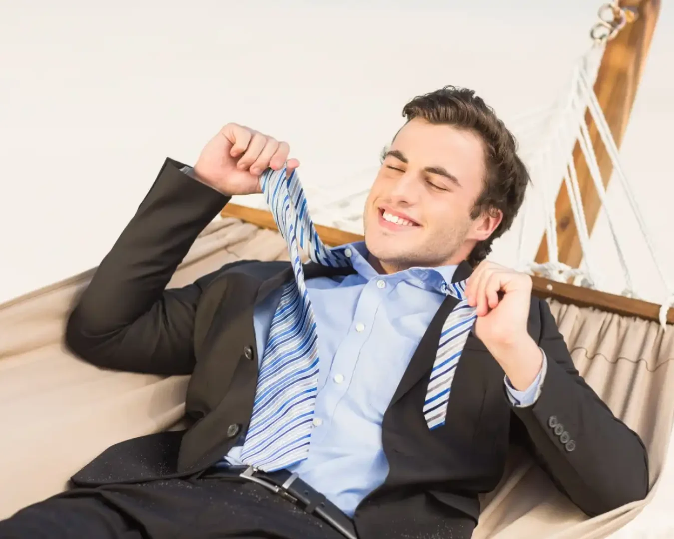 an image of a male accountant relaxing in a hammock, symbolising the stress-free Audit Readiness Services DBA Advisory provides
