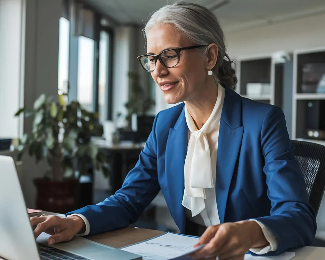 professional-businesswoman-managing-documents-desk copy