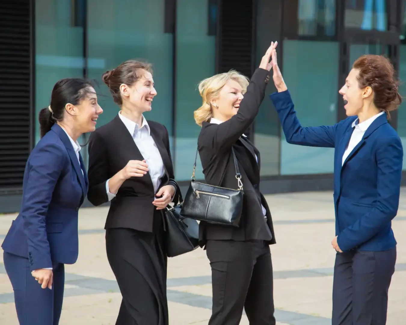 an image of a happy team of professionals after a successful Public Sector Advisory project for the city.